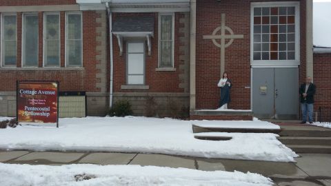 The Jesus statue stands outside the Cottage Avenue Pentecostal Fellowship before the vandalism.
