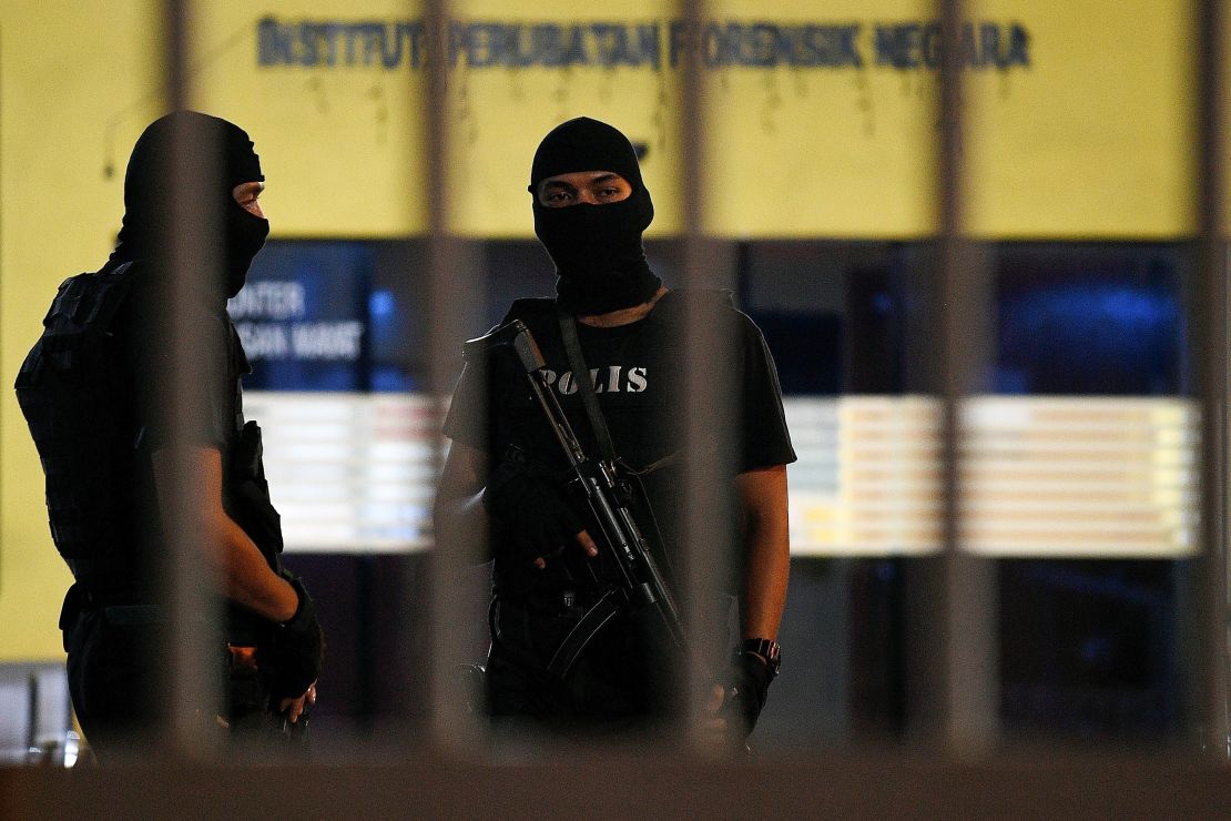 Royal Malaysian Police Special Forces personnel stand guard inside the compound of the forensic wing at Hospital Kuala Lumpur in the early hours of Tuesday, where the body of a North Korean man suspected to be Kim Jong Nam, the estranged half-brother of North Korean leader Kim Jong Un, is being kept.