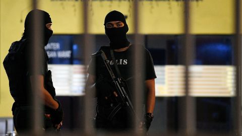 Royal Malaysian Police Special Forces personnel stand guard inside the compound of the forensic wing at Hospital Kuala Lumpur in the early hours of Tuesday, where the body of a North Korean man suspected to be Kim Jong Nam, the estranged half-brother of North Korean leader Kim Jong Un, is being kept.