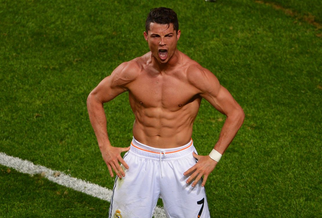 Cristiano Ronaldo celebrates scoring a goal during a match between Real Madrid and Atletico de Madrid in 2014. 