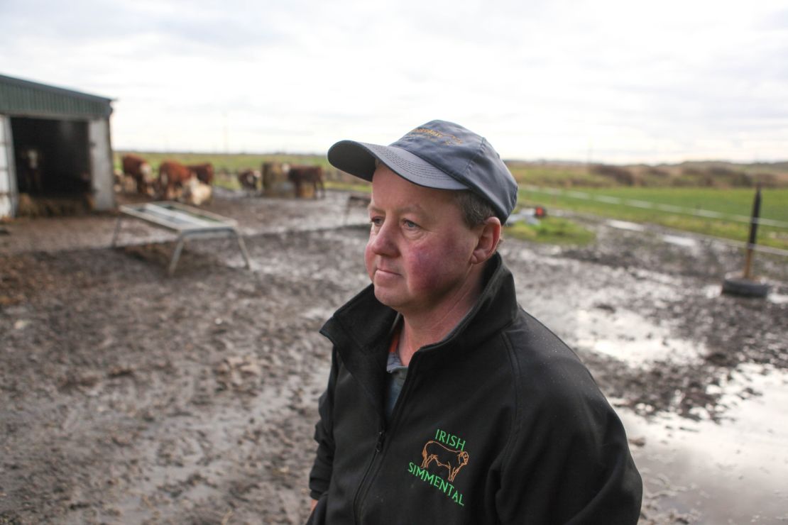 John Flanagan, a local cow farmer, has lived in Doonbeg all his life. His farm sits behind the course and is worried if the wall isn't built, his land will flood in the next 20 years. 
