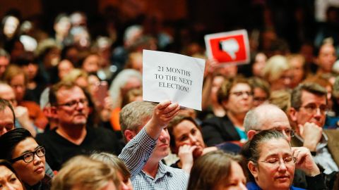 People listen as New Jersey Republican Congressman Leonard Lance speaks during a town hall meeting at Raritan Valley Community College on February 22, 2017 in Branchburg, New Jersey, where attendees demanded answers on health care.