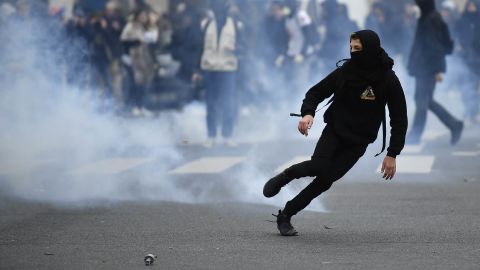 Students protest against the police in Paris Thursday.