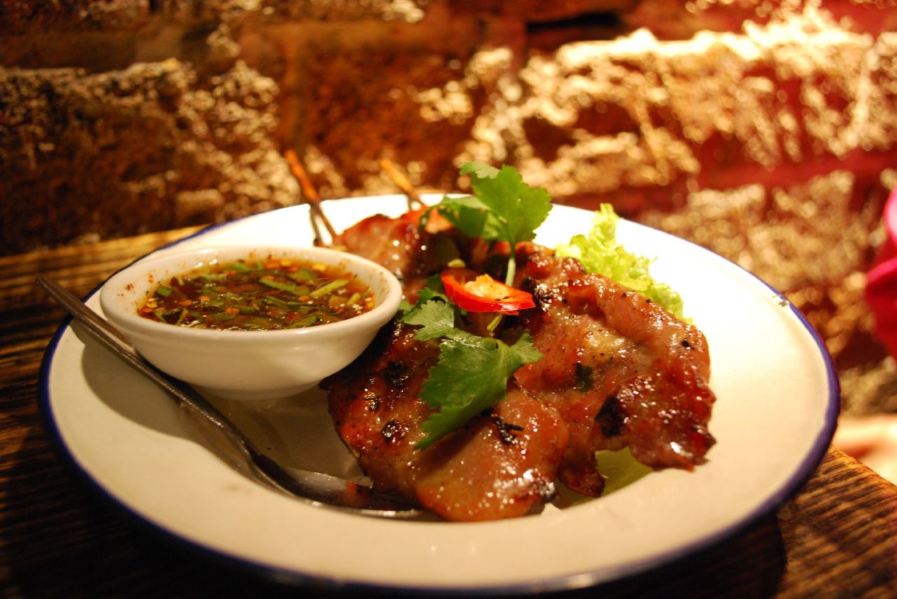 Grilled baby back ribs, marinated in fish sauce, palm sugar, and the basic marinade paste.