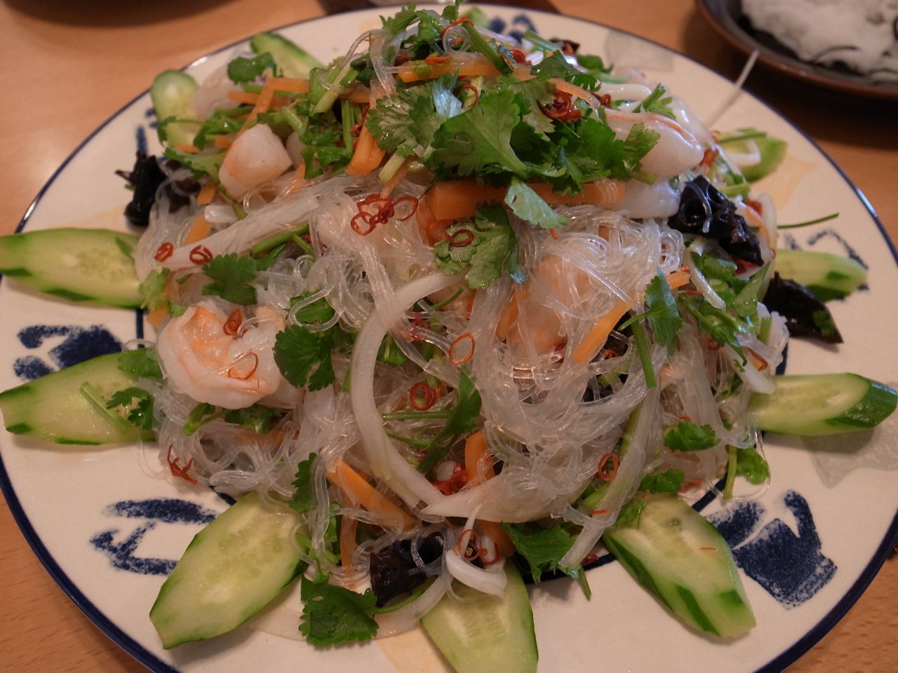 Grilled shrimp and green mango salad dressed with the basic dressing and topped with roasted cashews.