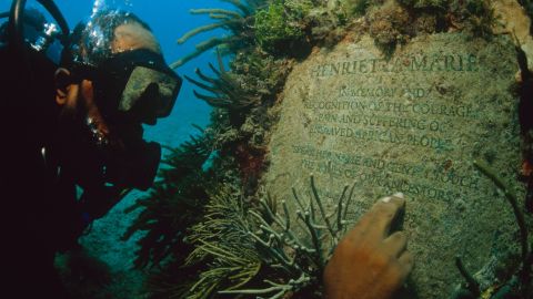 Michael Cottman at the underwater memorial that honors the African lives lost during the passages of the Henrietta Marie slave ship. 