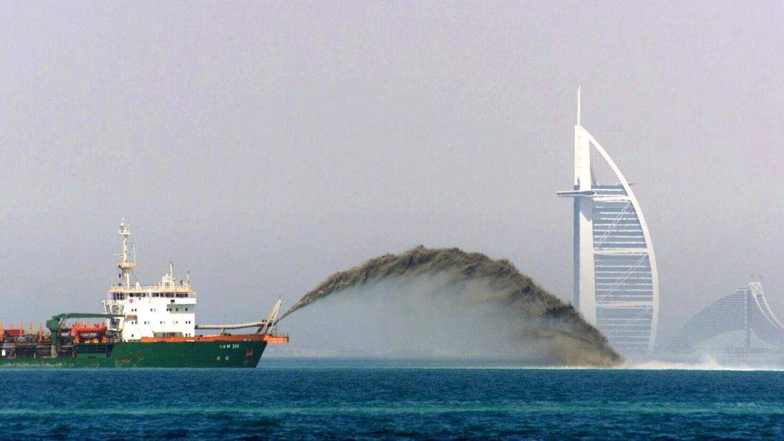 The dredger barge pictured pumps sand onto the sea to create the Palm Islands of Dubai -- one of the city's most extravagant projects and the world's largest artificial islands, built in the noughties. 