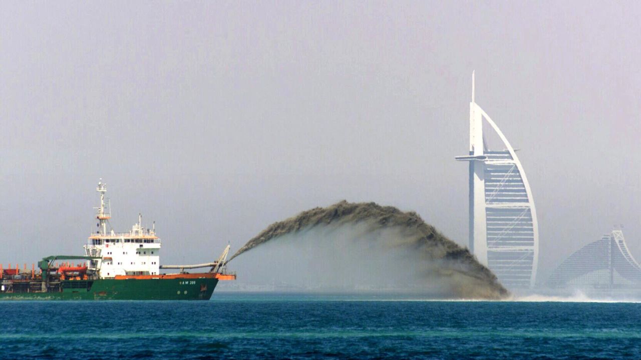 The dredger barge pictured pumps sand onto the sea to create the Palm Islands of Dubai -- one of the city's most extravagant projects and the world's largest artificial islands, built in the noughties.