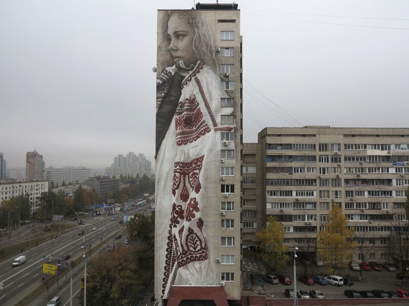 It took van Helten only ten days to paint this mural of a woman in traditional dress in Kiev, Ukraine.