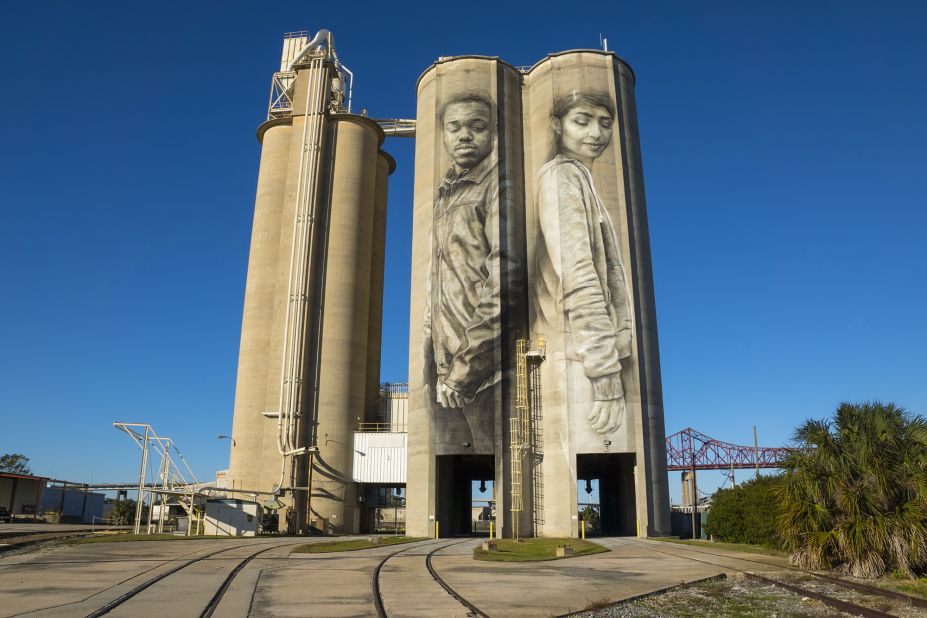 This silo mural painted in Jacksonville, Florida, US is entitled "Unity" and depicts a deaf activist called Connell and Sara, a Palestinian-American.