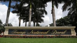 A sign reading Trump National Doral is seen on the grounds of the golf course owned by Donald Trump on June 1, 2016 in Doral, Florida.  