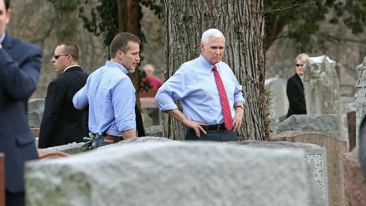 Missouri Gov. Eric Greitens, center left, and Vice President Mike Pence help cleanup efforts Wednesday, February 22, at the Chesed Shel Emeth Society cemetery in University City, Missouri. More than 100 grave markers <a href="http://www.cnn.com/2017/02/22/politics/jewish-cemetery-muslims-fundraising-trnd/" target="_blank">at the Jewish cemetery were vandalized,</a> police said. The vandalism report came on a day the White House <a href="http://www.cnn.com/2017/02/20/politics/white-house-denounces-jcc-threats/index.html" target="_blank">denounced a spate of recent bomb threats</a> against Jewish community centers across the country.