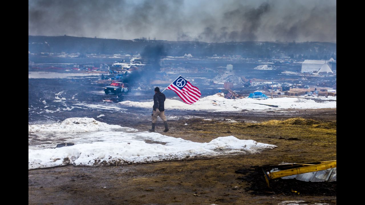 Smoke rises from the Oceti Sakowin campsite after protesters set their tents on fire Wednesday, February 22, in Cannon Ball, North Dakota. Activists have occupied the area for months to protest the Dakota Access Pipeline, but the state <a href="http://www.cnn.com/2017/02/22/us/dakota-access-pipeline-evacuation-order/" target="_blank">recently ordered an emergency evacuation</a> to allow private contractors to remove waste from the camp area. One tribal member told CNN that some of the tents were frozen into the ground and had to be burned to be removed. Other members said the fires are part of a tribal tradition.