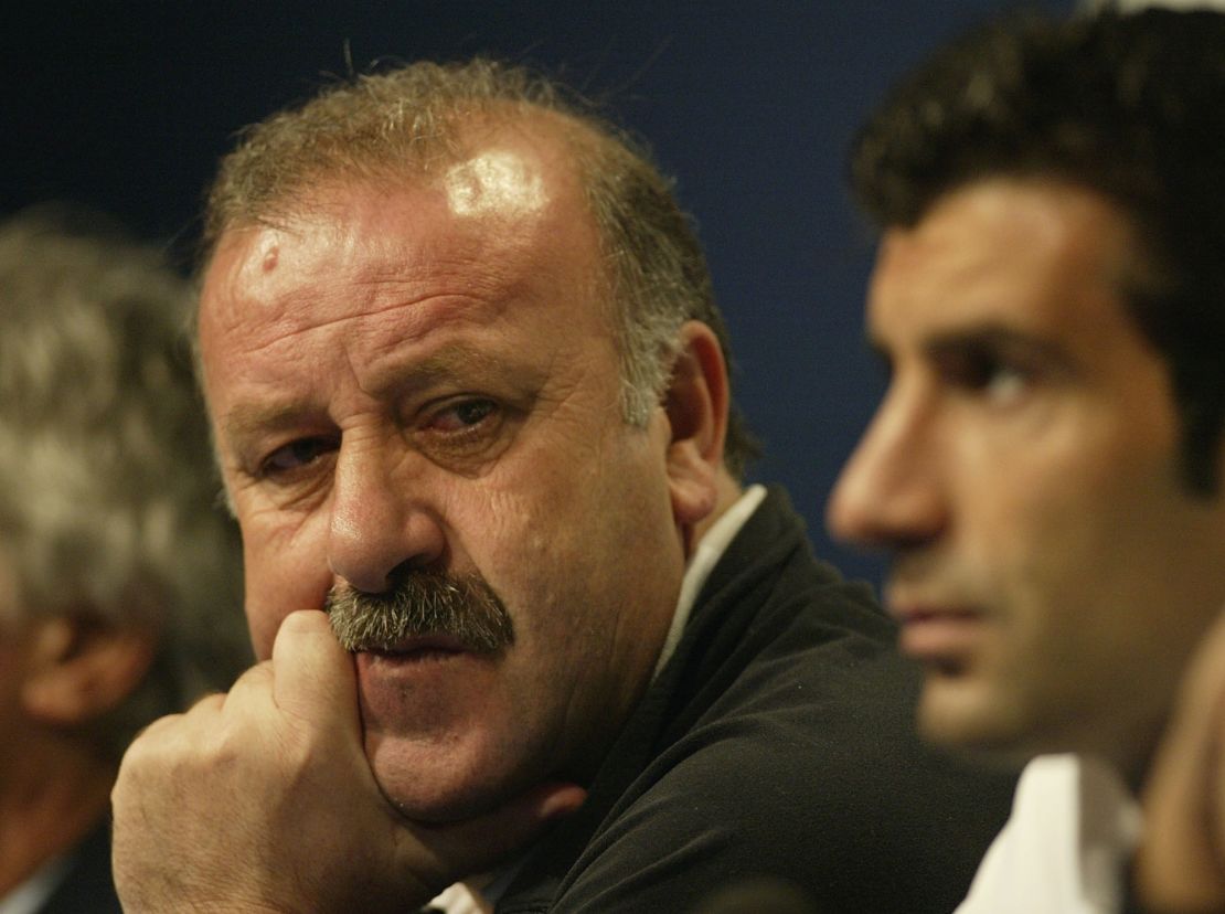 Then-Real Madrid head coach Vicente del Bosque (left) talks to the press as Luis Figo looks on during a press conference at Hampden Park, Glasgow in 2002.