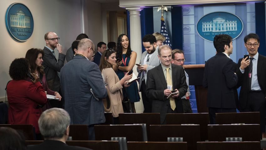 Reporters leave after failing to get access to an off camera briefing with White House Press Secretary Sean Spicer and a small group of reporters instead of the normal on camera briefing at the White House on February 24, 2017 in Washington, DC.