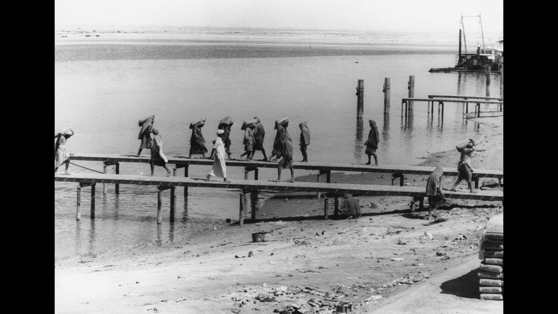 In 1966 the Fateh oilfield was discovered offshore from Dubai. Following the discovery, Sheikh Rashid Bin Saeed al Maktoum, the ruler of Dubai from 1958 to 1990, initiated large scale development programs. The Cement Wharf in Dubai, pictured above, flourished during that period because of the construction boom.