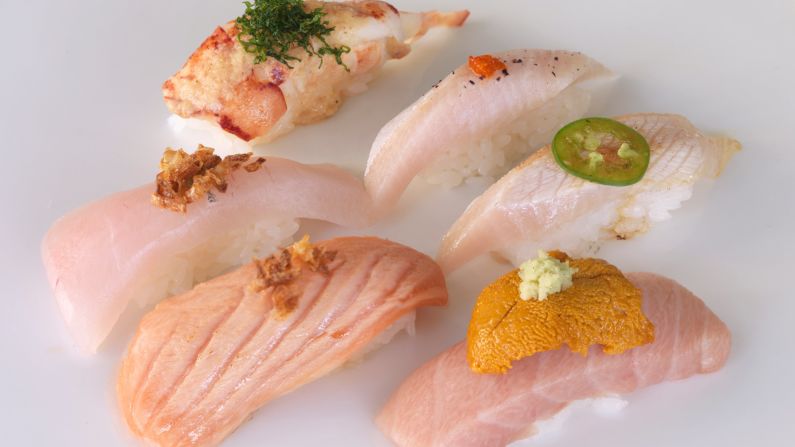 <strong>Imoto. </strong>This hidden gem feels like a Japanese speakeasy, serving creative versions of nigiri -- slices of rice topped with raw fish and wood-fired vegetables.