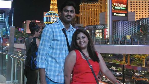 In this undated photo provided by Kranti Shalia, Srinivas Kuchibhotla, left, poses for photo with his wife Sunayana Dumala in Las Vegas.
