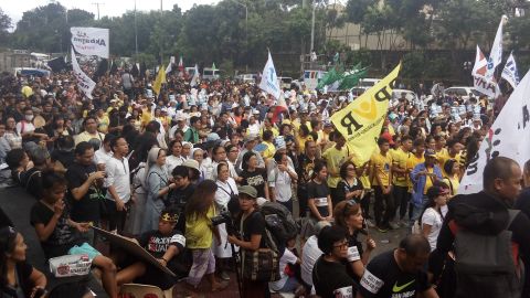 Filipinos mark the anniversary of the 1986 uprising against dictator Ferdinand Marcos Saturday.