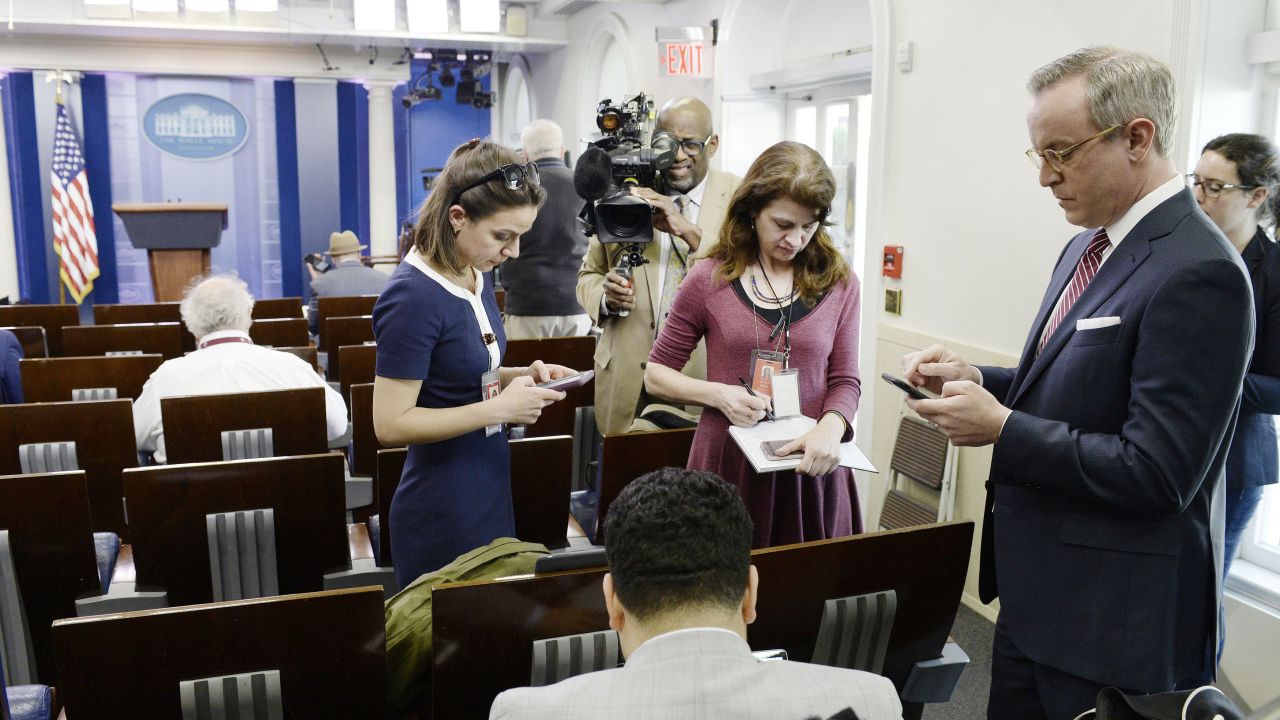 Reporters stand in the White House press briefing room after being excluded from the meeting on Friday, February 24, in Washington. <a href="http://money.cnn.com/2017/02/24/media/cnn-blocked-white-house-gaggle/" target="_blank">CNN and other news organizations were blocked</a> Friday from a White House press briefing. The decision struck veteran White House journalists as unprecedented in the modern era. 