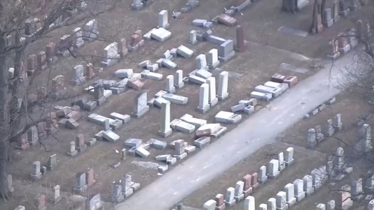 Another view of toppled headstones in Mt. Carmel cemetery.