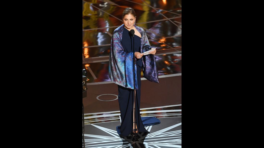 On behalf of Iranian director Asghar Farhadi, Anousheh Ansari accepts the Oscar for best foreign language film ("The Salesman"). Farhadi boycotted the Oscars because of an executive order signed by US President Donald Trump. That order, which temporarily suspended the admission of refugees and barred entry to the United States from Iran and six other Muslim-majority countries, was blocked by a federal judge earlier this month.