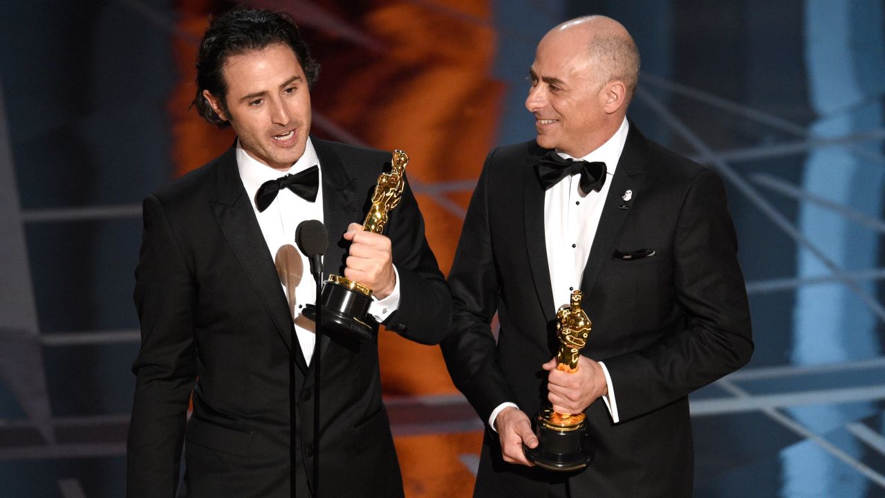 Alan Barillaro, left, and Marc Sondheimer accept the Oscar for best animated short film  ("Piper").