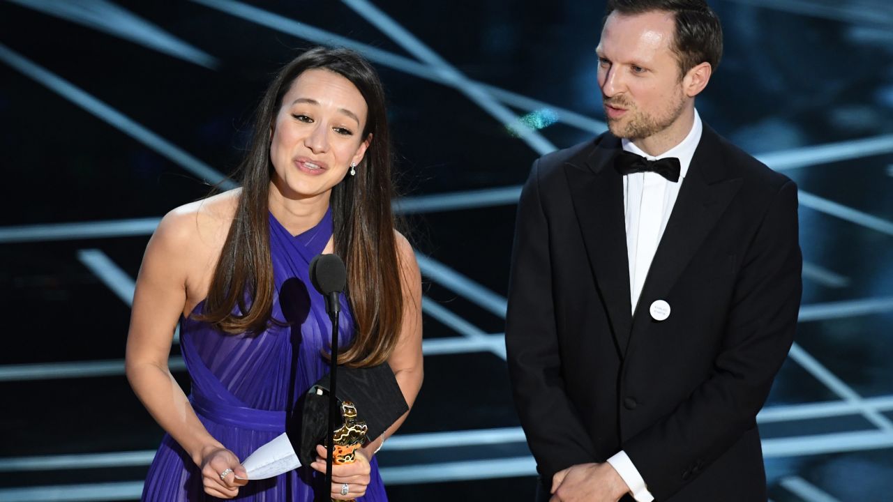 Producer Joanna Natasegara and director Orlando von Einsiedel accept the Oscar for best documentary (short subject). "The White Helmets" is about volunteer rescue workers in Syria.