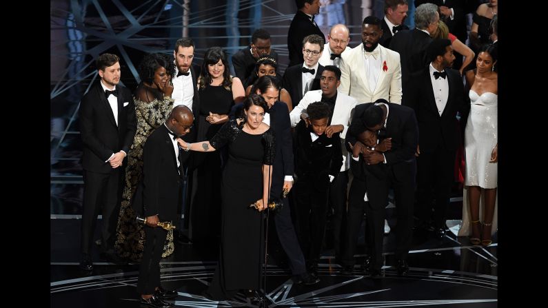 The cast and crew of "Moonlight" accept the best picture Oscar during <a href="index.php?page=&url=http%3A%2F%2Fwww.cnn.com%2F2017%2F02%2F26%2Fentertainment%2Foscars-2017%2Findex.html" target="_blank">the Academy Awards</a> on Sunday, February 26. The winner was initially announced as "La La Land" by presenter Faye Dunaway, but moments later it was revealed that there was a mistake and "Moonlight" had actually won.