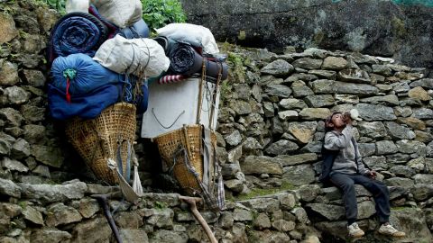 Take a load off: porters are often paid by the kilo.