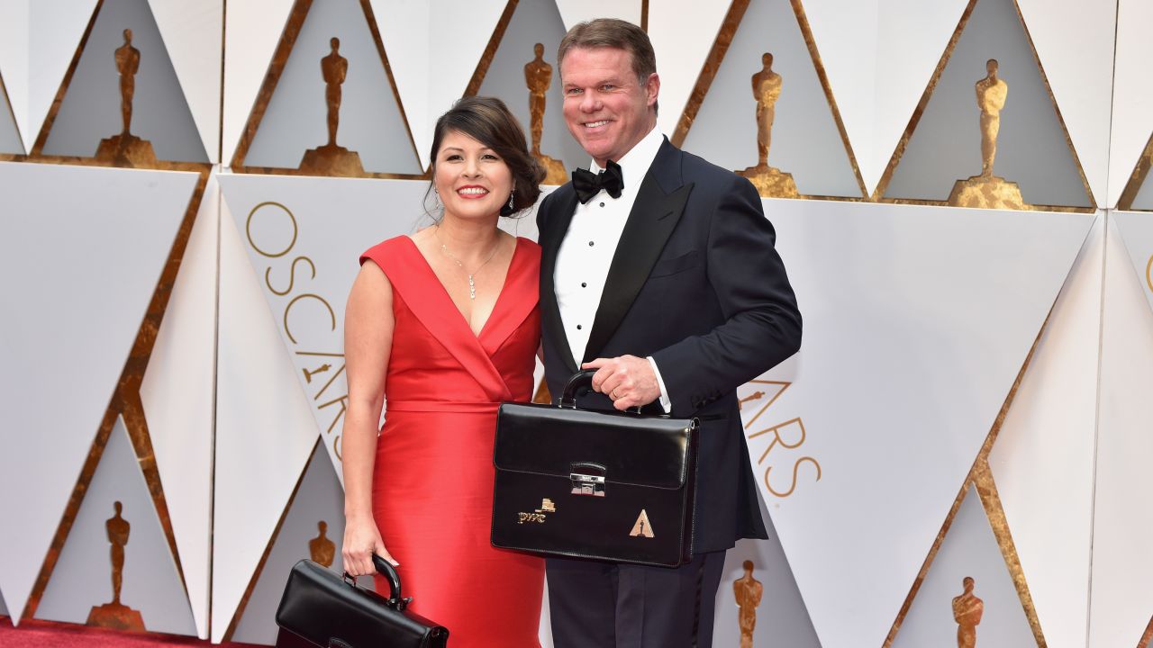 PwC representatives Martha Ruiz and Brian Cullinan 
