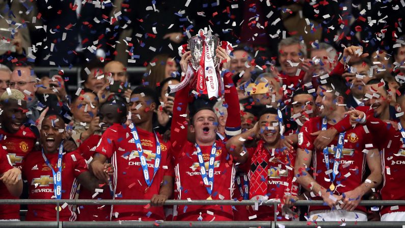 Manchester United captain Wayne Rooney lifts the EFL Cup after a 3-2 victory over Southampton on Sunday, February 26. The annual competition involves the 92 clubs in England's soccer pyramid.