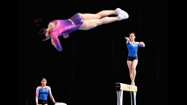 Gymnasts practice at a World Cup event in Melbourne on Tuesday, February 21.