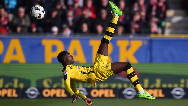 Dortmund's Ousmane Dembele performs an overhead kick during a German league match against Freiburg on Saturday, February 25. 