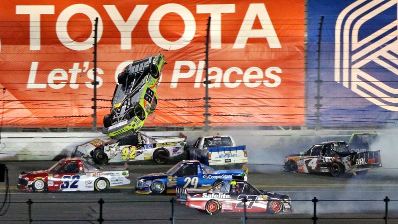 NASCAR driver Matt Crafton goes airborne during a wreck in the Truck Series race in Daytona Beach, Florida, on Friday, February 24. The vehicle landed on its wheels and Crafton was unhurt.