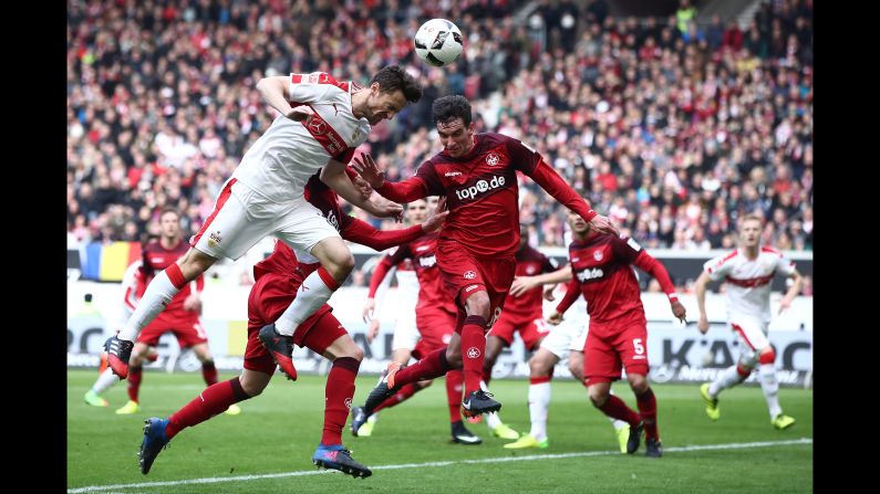 Stuttgart's Christian Gentner, left, heads the ball during a German league match against Kaiserslautern on Sunday, February 26. <a href="index.php?page=&url=http%3A%2F%2Fwww.cnn.com%2F2017%2F02%2F20%2Fsport%2Fgallery%2Fwhat-a-shot-sports-0221%2Findex.html" target="_blank">See 26 amazing sports photos from last week </a>