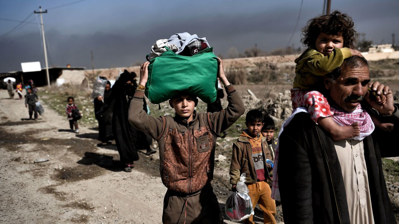 Displaced Iraqis flee Mosul this week during an operation to retake the city from ISIS.