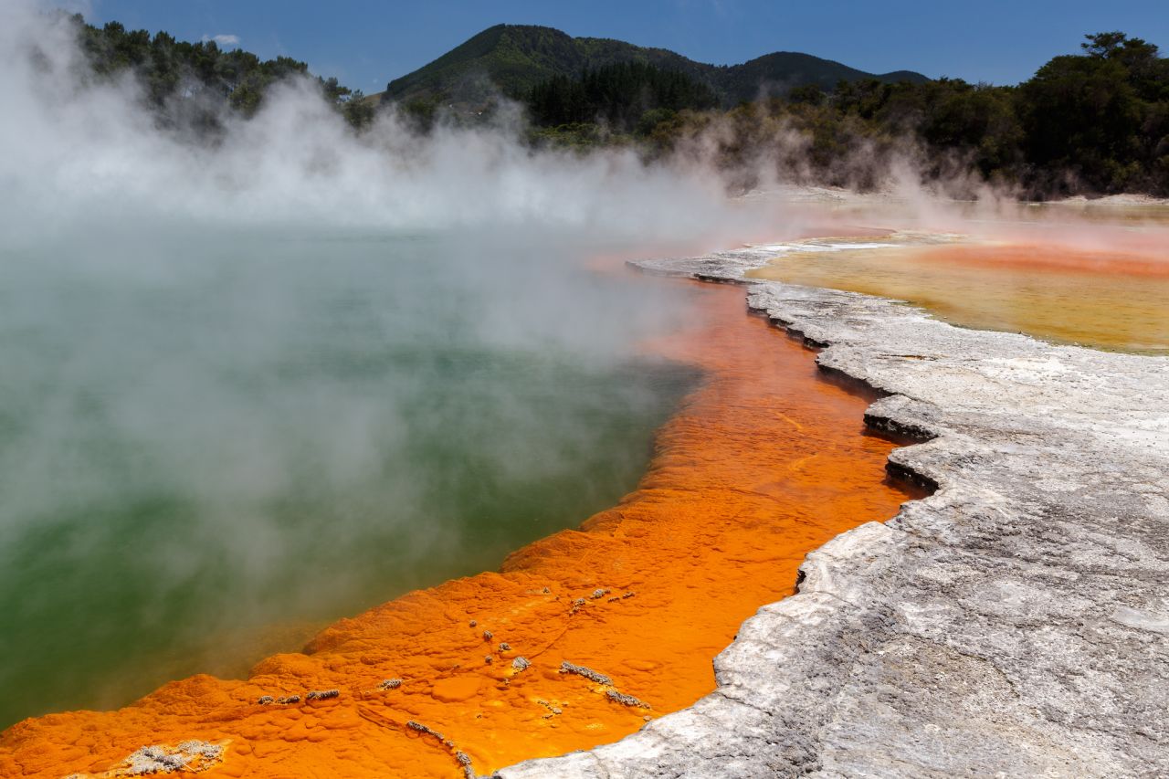 Enjoy the Wai-O-Tapu hot springs in Auckland's geothermal zone.