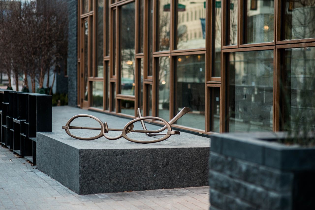 Oversized eyeglasses greet guests at The Study at University City, a new boutique hotel in Philadelphia. The sculpture represents the moment when readers finally put their glasses down and nod off after reading a great book, says hotelier Paul McGowan.