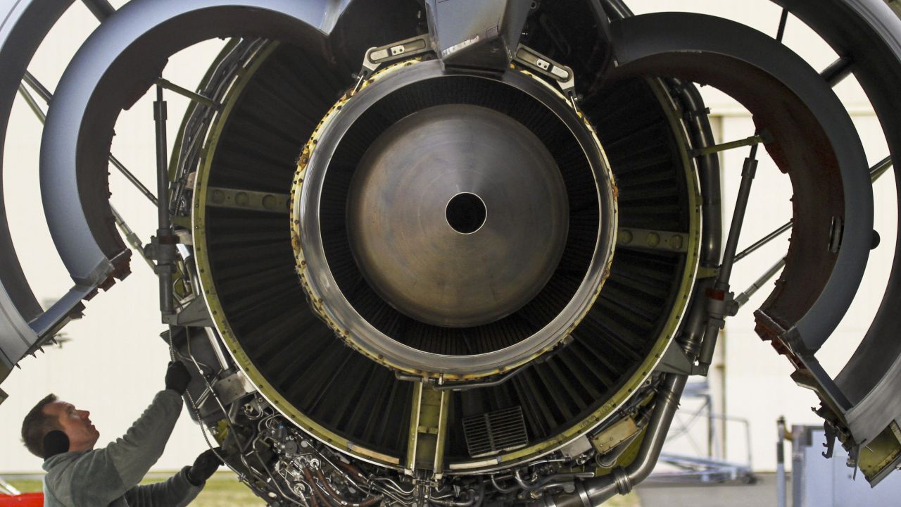 Staff Sgt. Travis Laverne, of the New Jersey Air National Guard, troubleshoots an aircraft engine at a base outside Trenton, New Jersey, on Sunday, February 26.