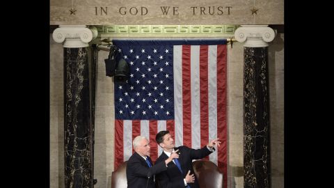 Pence confers with Ryan before Trump's speech.