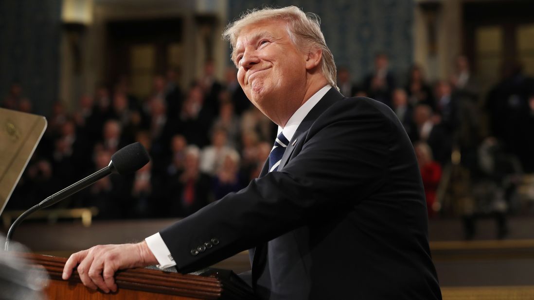Trump smiles during his speech, which lasted over an hour.