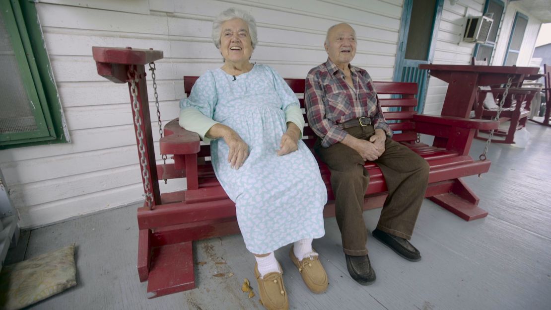 Wenceslaus and Denicia Billiot on the porch of their home