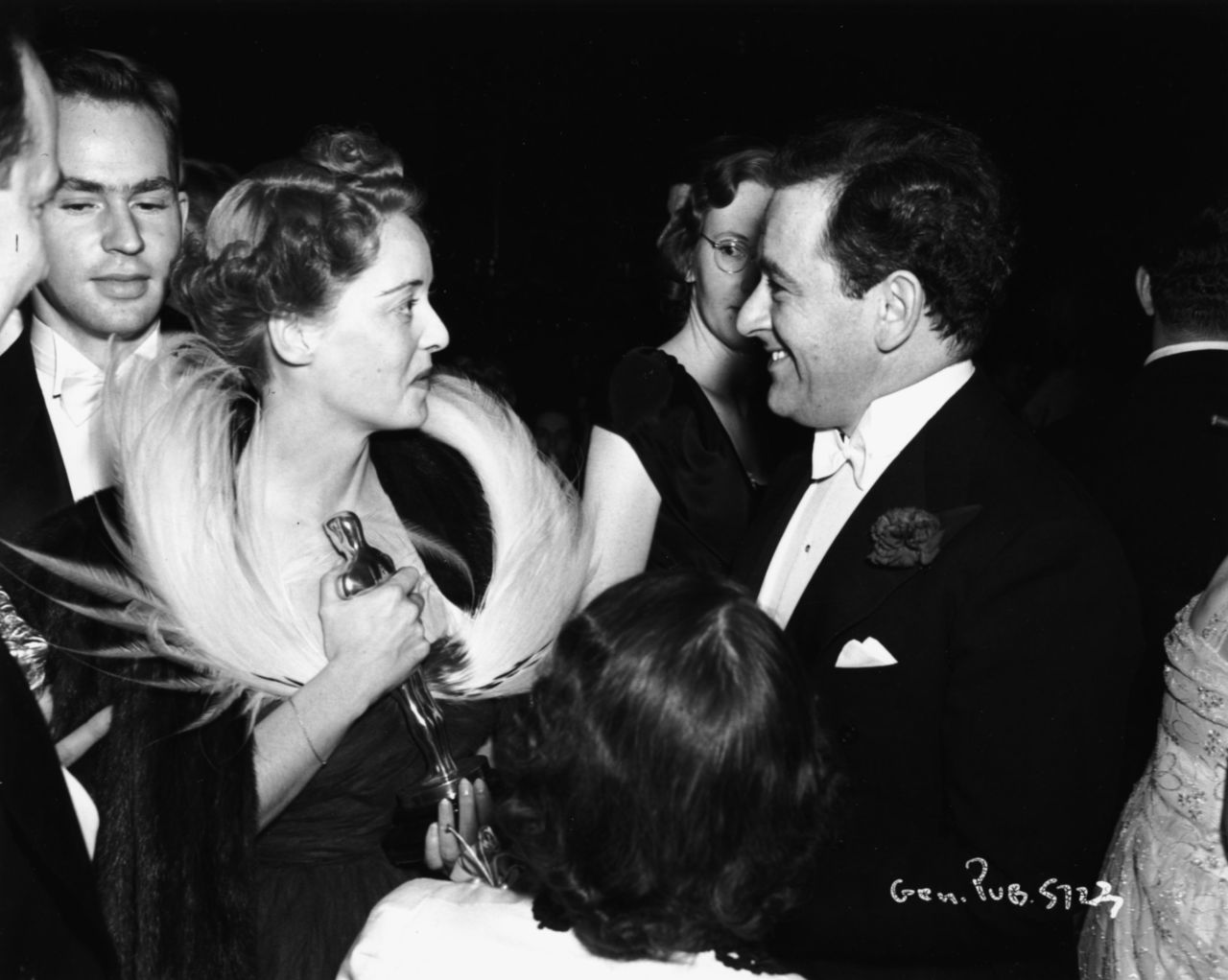 Davis chats with her favorite director, William Wyler, after winning her second Oscar. She took home the prize as a Southern belle in Wyler's "Jezebel" (1938), consolation for losing the role of Scarlett O'Hara in "Gone With the Wind." Wyler also directed her in "The Letter" (1940) and "The Little Foxes" (1941). "I would have jumped into the Hudson River if this man had told me to, directorially speaking," Davis said in her 1962 autobiography, "The Lonely Life."