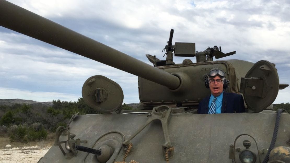 When driving a tank, CNN's Richard Roth prefers business attire.