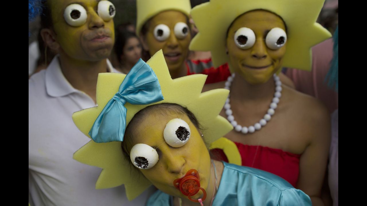 Carnival revelers wear "Simpsons" costumes during a street party in Rio de Janeiro on Saturday, February 25.