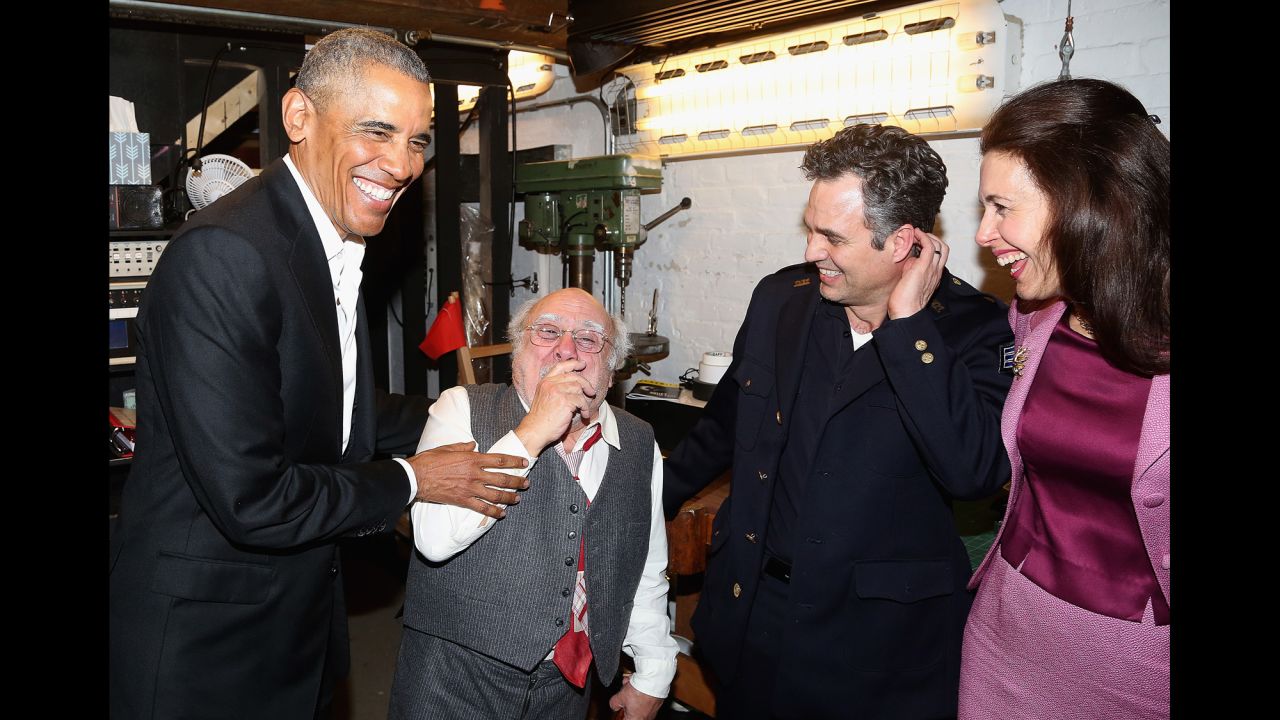 Former US President Barack Obama, left, chats backstage with actors Danny DeVito, Mark Ruffalo and Jessica Hecht at the Broadway production of Arthur Miller's "The Price" on Friday, February 24.