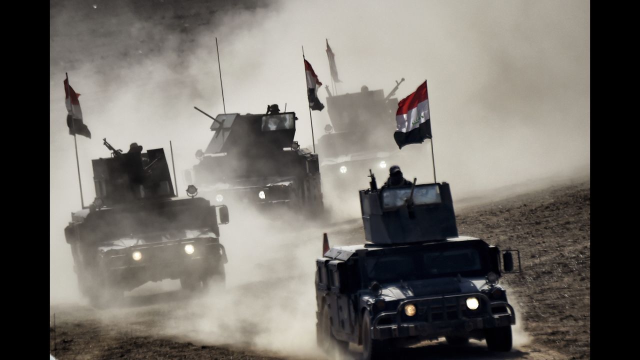 Iraqi troops advance during <a href="http://www.cnn.com/2016/10/17/world/gallery/mosul/index.html" target="_blank">the offensive to take back the northern city of Mosul</a> on Friday, February 24. Mosul had been under the control of the ISIS terror group.