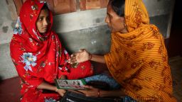 (Right) Rebeka Akhter, a social worker from  Ashkarpur Community Clinic provides counselling for 16 years old  (left) Reksona who is 5 months pregnant at Ashkarpur, Satkhira on 31 July 2013.


In August 2013 in Bangladesh, stark economic disparities hamper the fulfilment of child rights. Some 43 per cent of inhabitants live on less than US$1.25 per day. The poorest 40 per cent of Bangladeshis receive only 21 per cent of the countrys income compared to the 41 per cent received by the richest quintile. Children from the poorest families are also significantly more likely to be underweight and less likely to have a skilled attendant present at their birth or to be registered afterward. Without a birth certificate, childrens access to basic social services, including school, remains restricted. While 85 per cent of primary-school-aged males and 88 per cent of females attend primary school, only 45 per cent of secondary-school-aged males and 50 per cent of females are enrolled in secondary school. Educational opportunity is further hampered for the 13 per cent of children aged 514 years who are involved in labour, with their work often critical to their familys survival. Early marriage and its ensuing risk of early pregnancy also threaten girls educational achievement and overall well-being; nearly a third of women aged 20-24 years reported being married by age 15, nearly two thirds by age 18. Inequities along gender lines are also borne out in maternal health indicators: Only 55 per cent of women have at least one antenatal care visit during pregnancy, while only 26 per cent have four or more. UNICEF supports programmes in health; nutrition; water, sanitation and hygiene; education; and child protection in addition to undertaking emergency responses in the country, which remains particularly susceptible to regular floods, cyclones and other natural disasters.