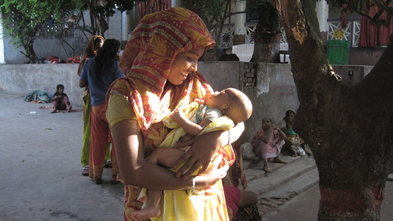 Sharmin, pictured in 2010, lived on the streets with a newborn after her husband abandoned her.